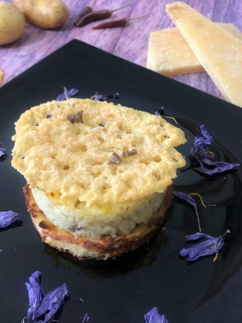 Risotto al tartufo su tortino di patate ricetta primi